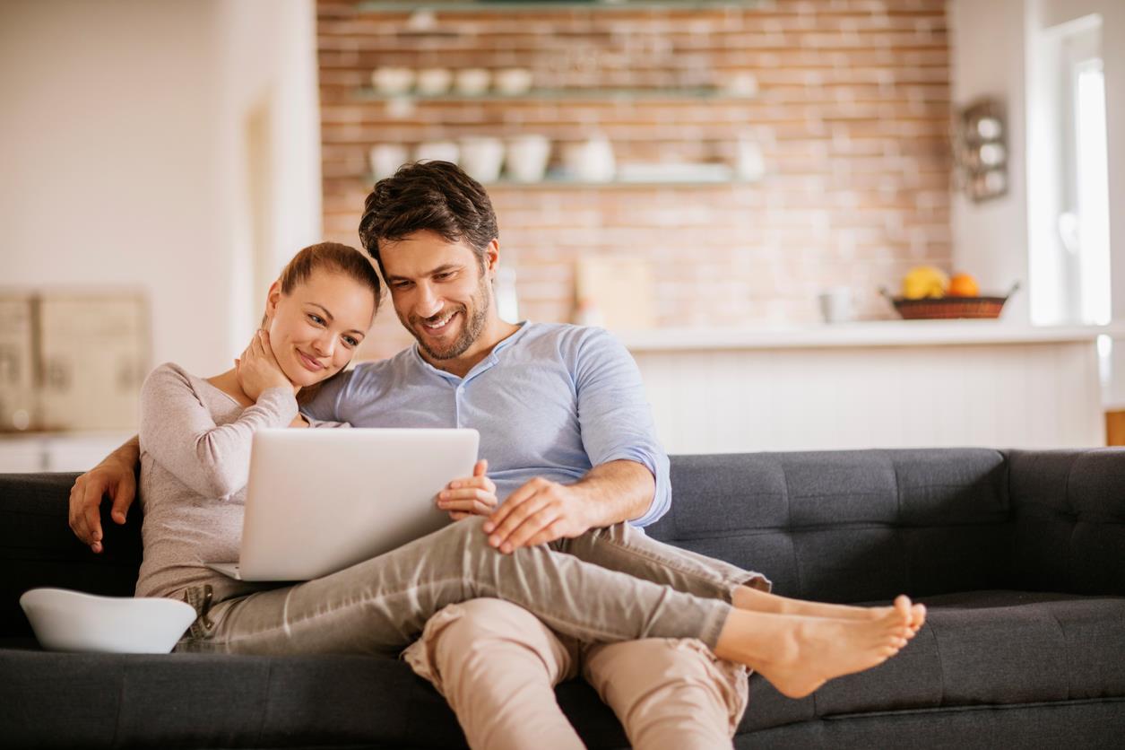 couple with computer couple with computer